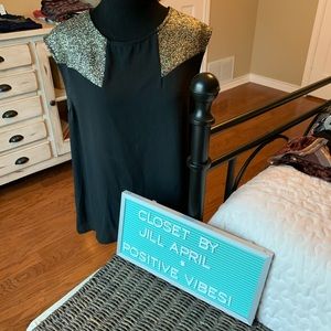 Black and gold top from Francesca’s, medium